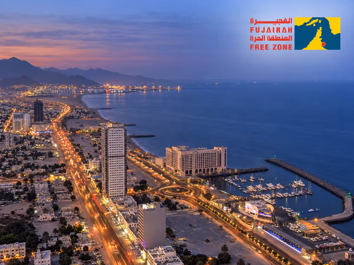 Waterfront at dusk with Fujairah Free Zone branding